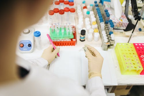 an operator testing a specimen in the lab